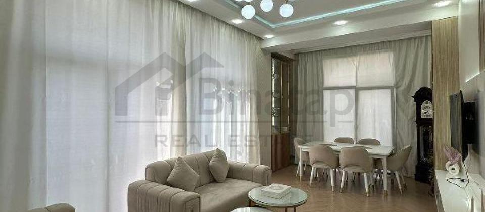 Heydər Əliyev Mərkəzinin yanında 4 otaqlı mənzil satılır/128 kv.m.