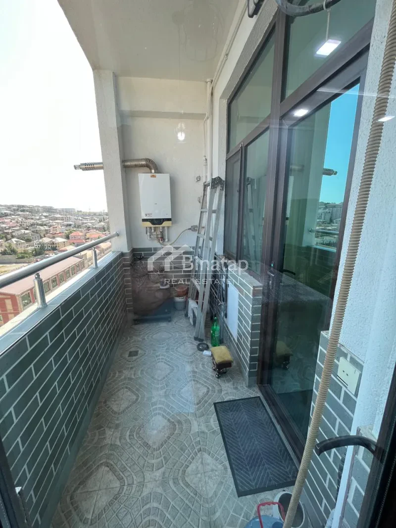 Продаётся 3-комн. новостройка 95 м², м. Элмляр Академиясы — фото 11