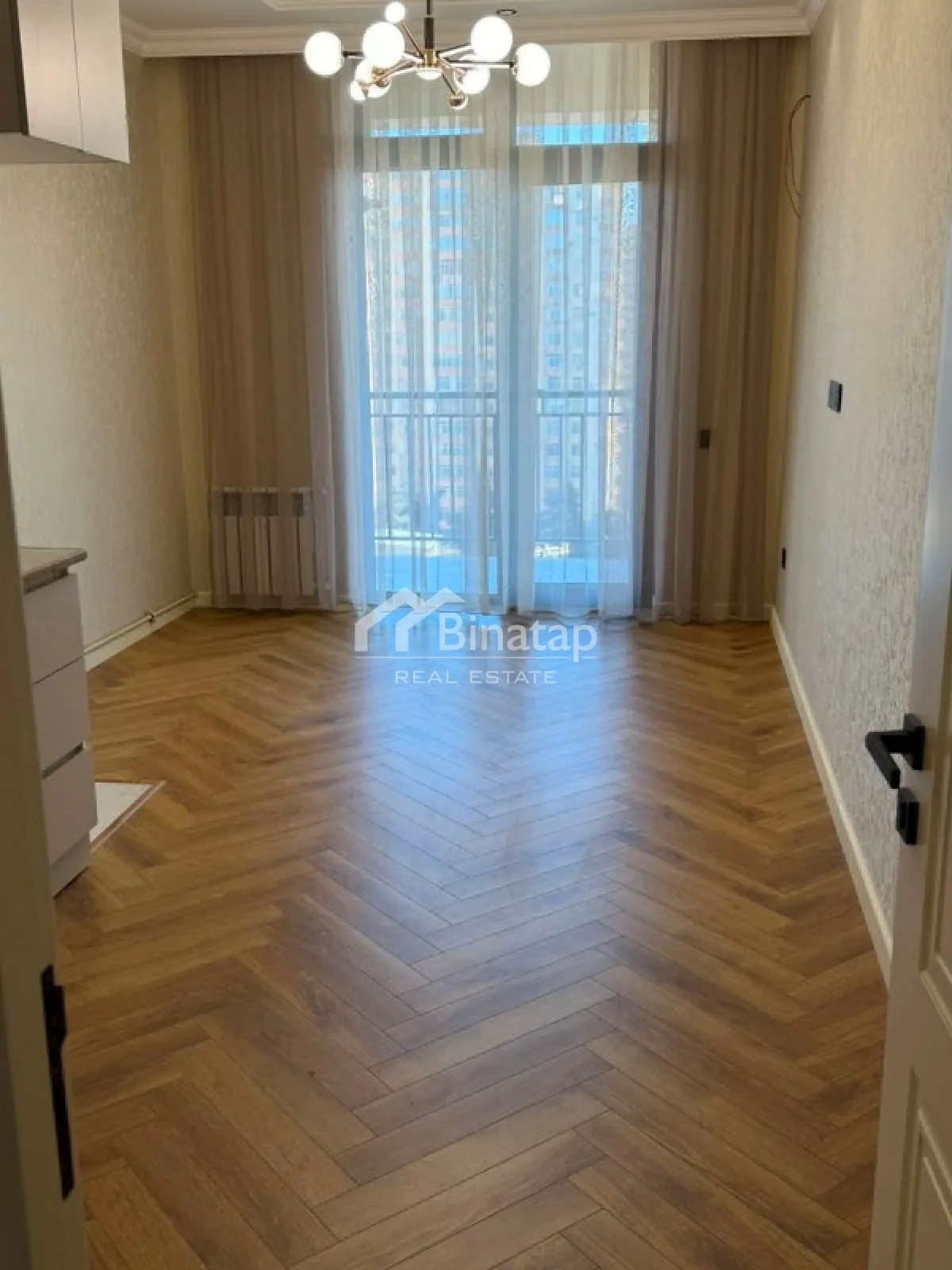 Satılır 2 otaqlı yeni tikili 58 m², İnşaatçılar m. — şəkil 1