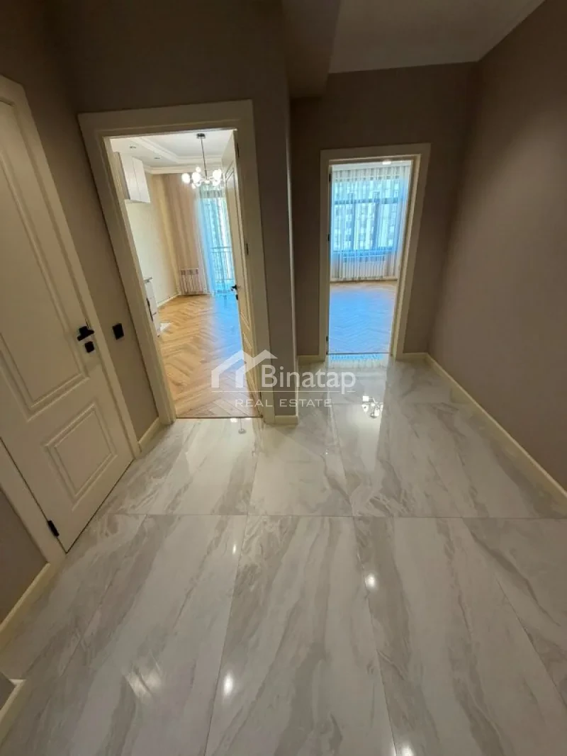 Satılır 2 otaqlı yeni tikili 58 m², İnşaatçılar m. — şəkil 11